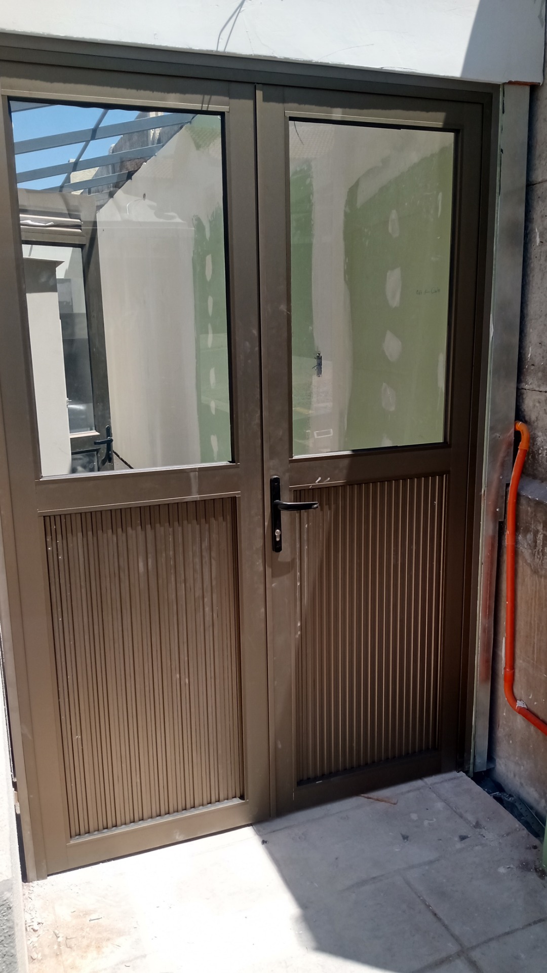 Puerta doble hoja en linea AM35